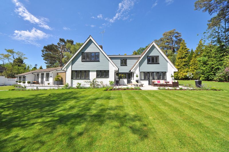 Family home with a large lawn and garden